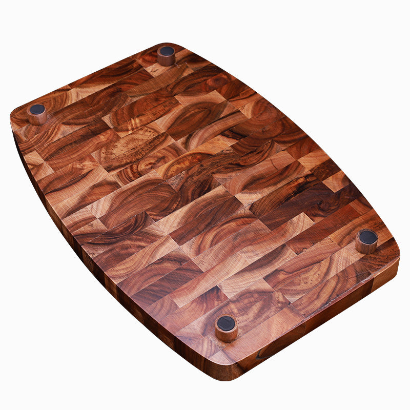 Bottom of the Wooden Walnut End-Grain Cutting Board showing the stands to cutting board is on, as well as the wood grain at the bottom of the cutting board.