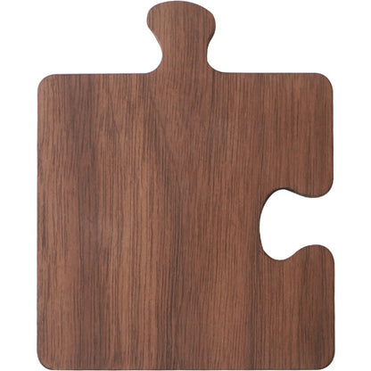 Close up of the Black Walnut Puzzle Wood Coaster showing the grain and color.