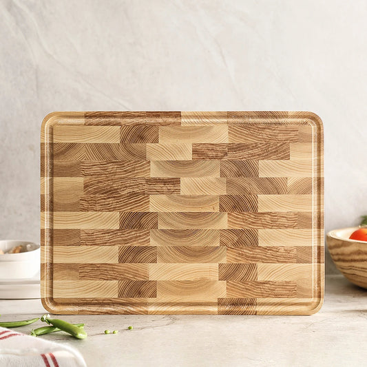 The Ash Wood End-Grain Cutting Board  standing horizontally show casing the ash wood grain.