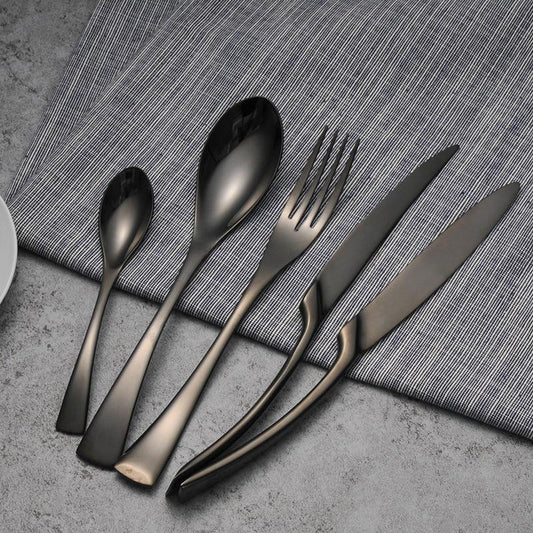 The Matte Black Stainless Steel 4-Piece Cutlery Set with an extra knife.
