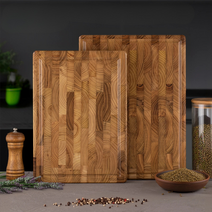 The large and small Teak Wood End-Grain Cutting Board stacked next to each other.