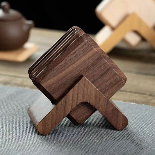 Black Walnut Squared Coasters Set stacked on the wooden coaster holder, being able to hold all 6 coasters.